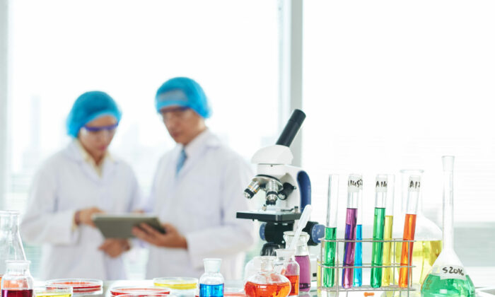 Laboratory glassware and microscope